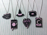 black & pink witchcraft necklaces