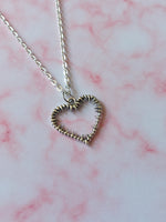 barbed heart necklace