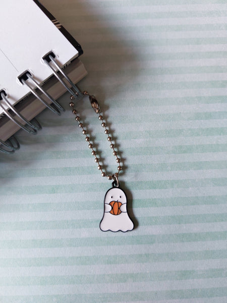 ghost holding pumpkin planner charm