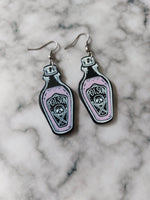 pink poison bottle earrings