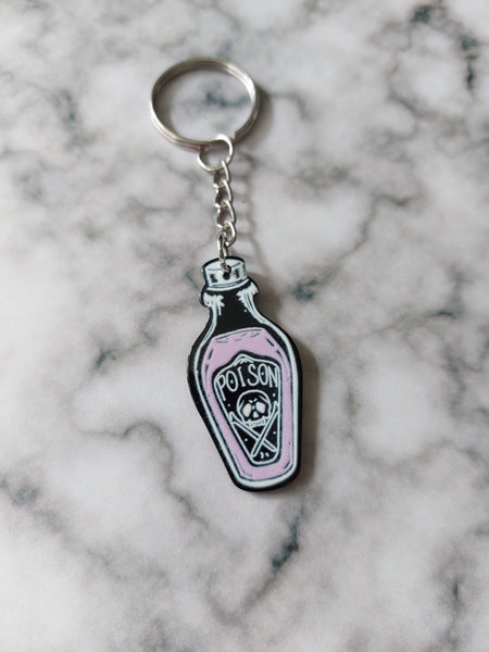pink poison bottle keyring 