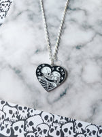 skeleton lovers necklace