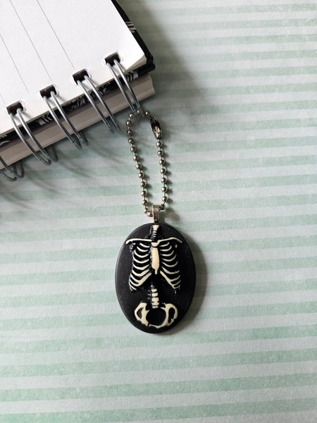 ribcage planner charm