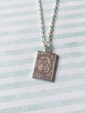 tarot card necklace - the world 