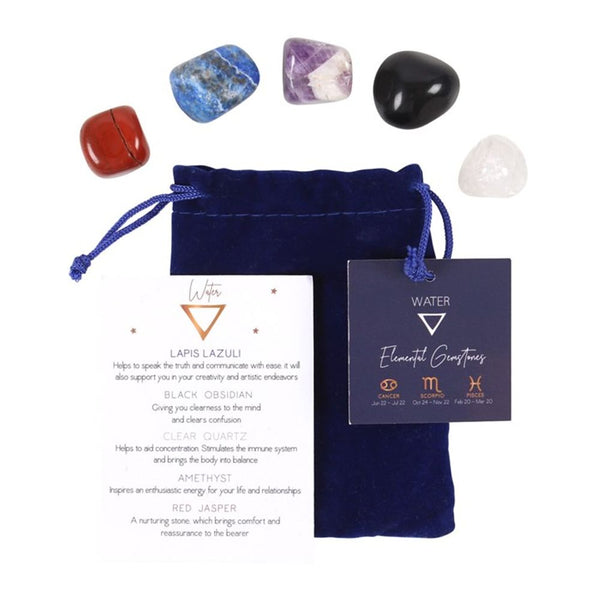 A set of five different colored gemstone tumblestones, including Lapis Lazuli, Black Obsidian, Clear Quartz, Amethyst, and Red Jasper, presented in a blue velvet drawstring bag with a hang tag and an informative insert card.