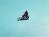 spiderweb pin badge