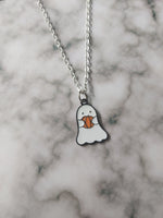 ghost holding pumpkin necklace