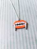 vampire fang necklace - orange 