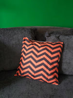 orange & black chevron cushion